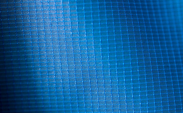 Aether 120 is a rip-stop fabric with tiny white lines forming a subtle check pattern.